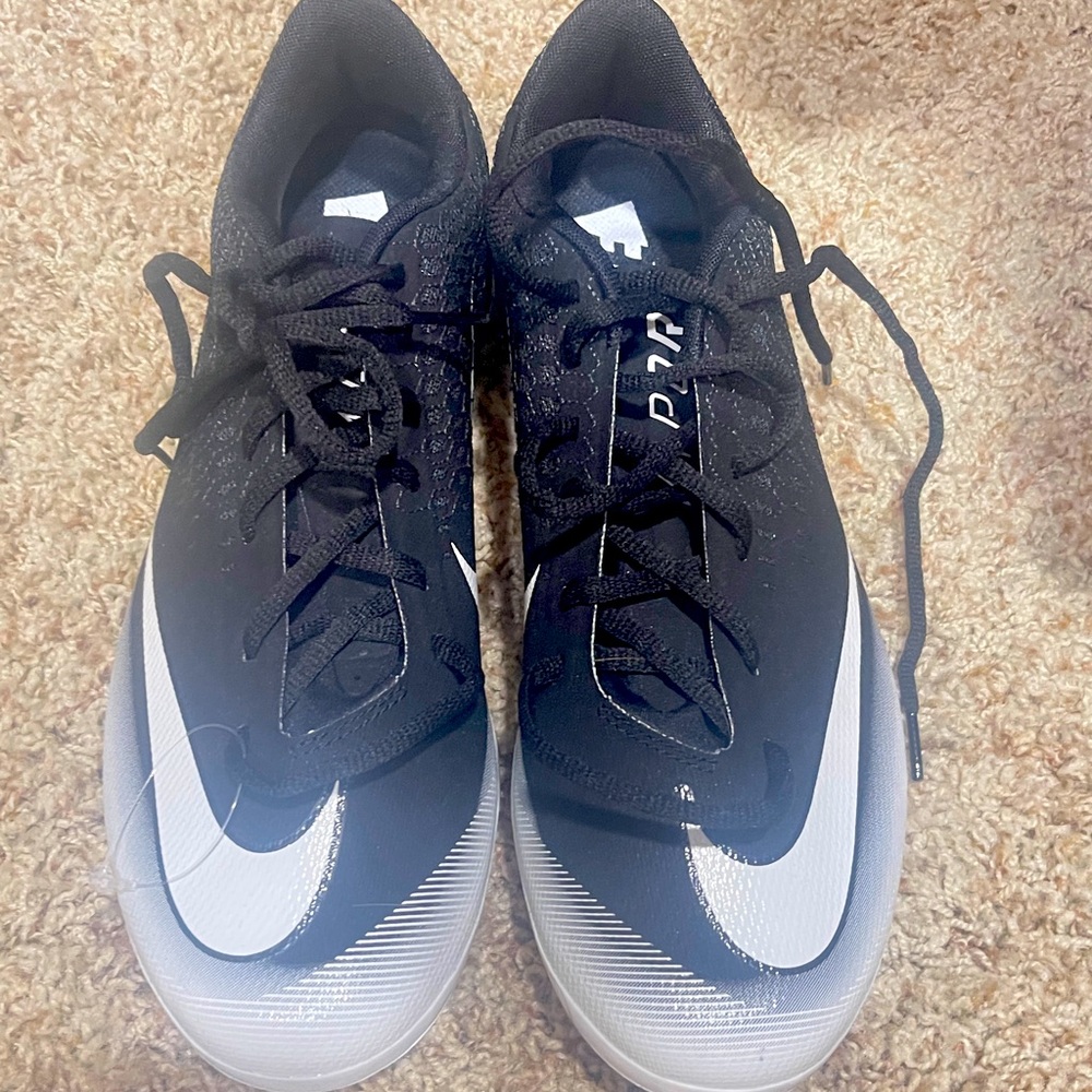 Baseball shoes man